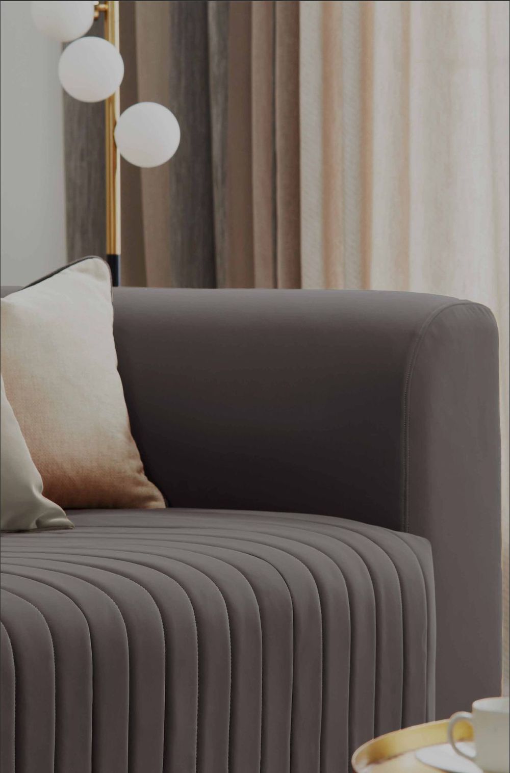 Channel-Tufted Sofa — Arm detail